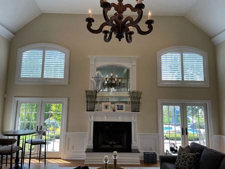 Hunter Douglas Custom Arch Top Plantation Shutters with 3 1/2