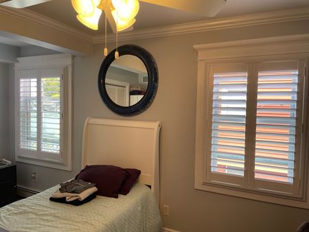 Hunter Douglas Plantation Shutters with Hidden Louver Tilts and Trim Casing Frames in Hasbrouck Heights, NJ Thumbnail